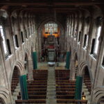 View down the nave of St George's Church, Stockport, from the roof during rope access work